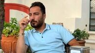 سیگار کشیدن نوید محمدزاده در کافه + عکس