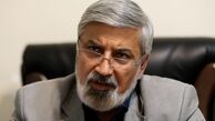 احمد شهید مشغول نوشتن دیکته آمریکا است