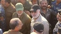 رونمایی از پوستر شهیدان سلیمانی و المهندس در عراق+ فیلم