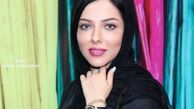 چهره لیلا اوتادی محاصره در بین گل‌ها