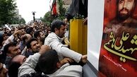احمدی نژاد روي سن!؟/ به جاي محسن رضایی، از عراقچی براي سخنران دعوت مي كرديد