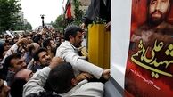 احمدی نژاد روي سن!؟/ به جاي محسن رضایی، از عراقچی براي سخنران دعوت مي كرديد